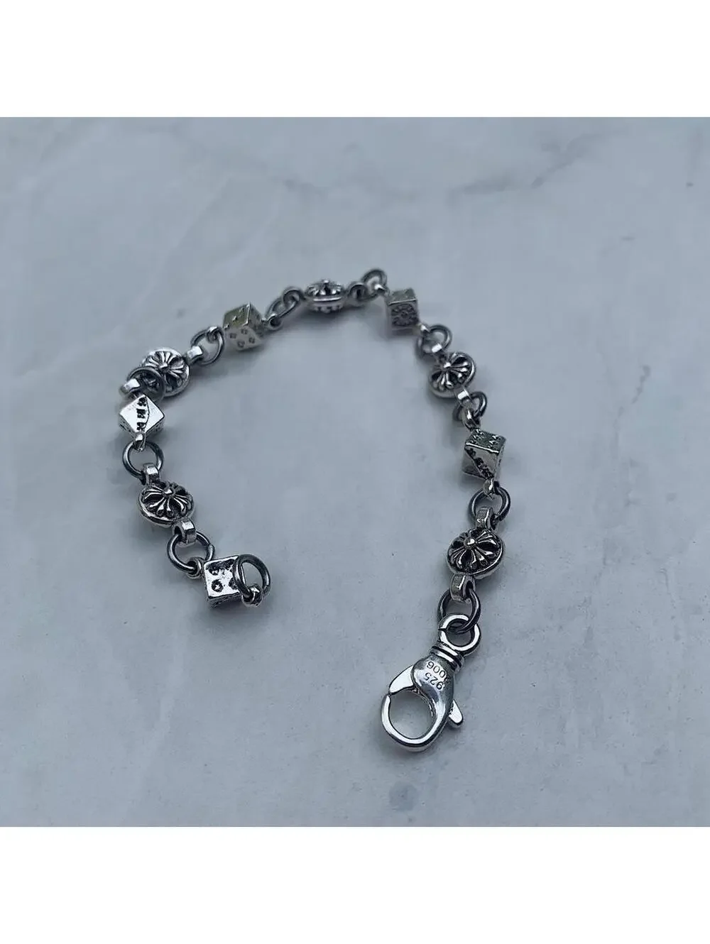 Y2k style grunge dice and gothic cross pendant silver punk bracelet. Comes new
